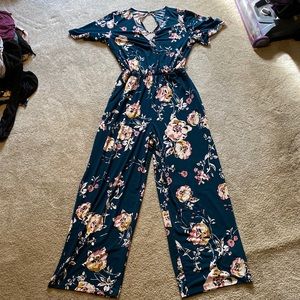 Jumpsuit. Blueish green floral.